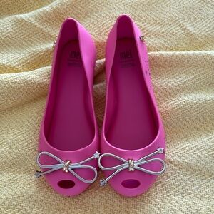 Melisa hot pink Mary Jane 1 nwot stars in gold on sides and gold toe bow
